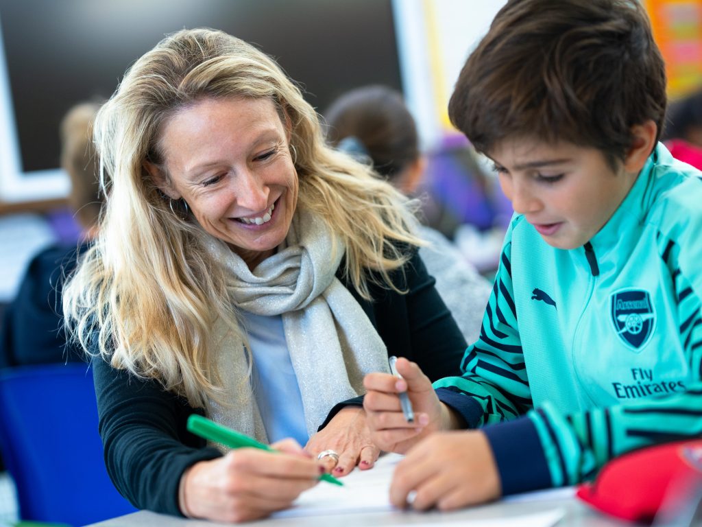 Y6 student working with teacher