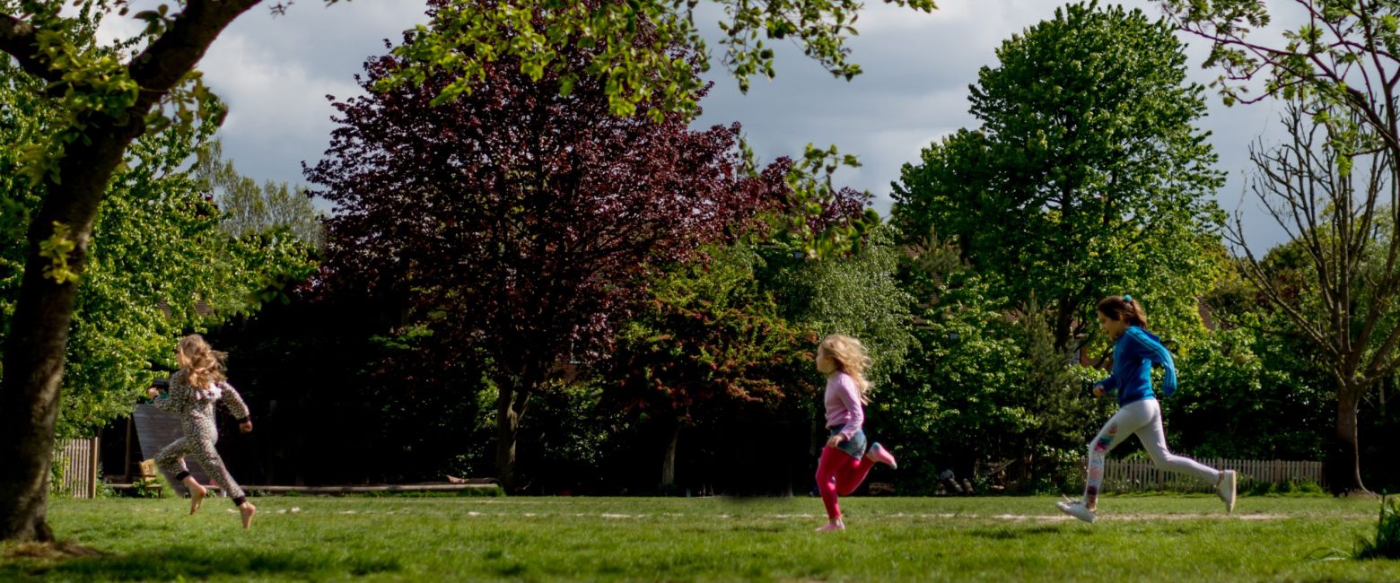 Girls running on field