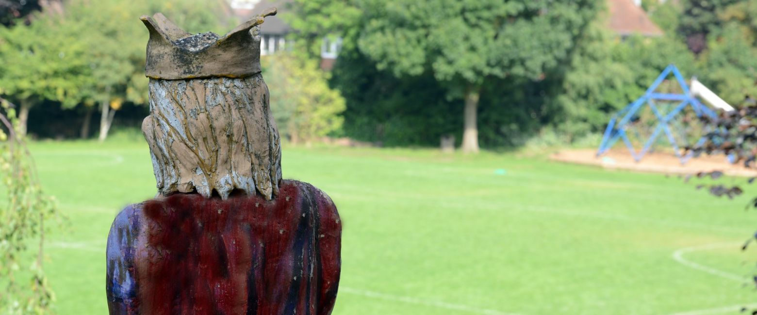 Statue of King Alfred looking out over the field