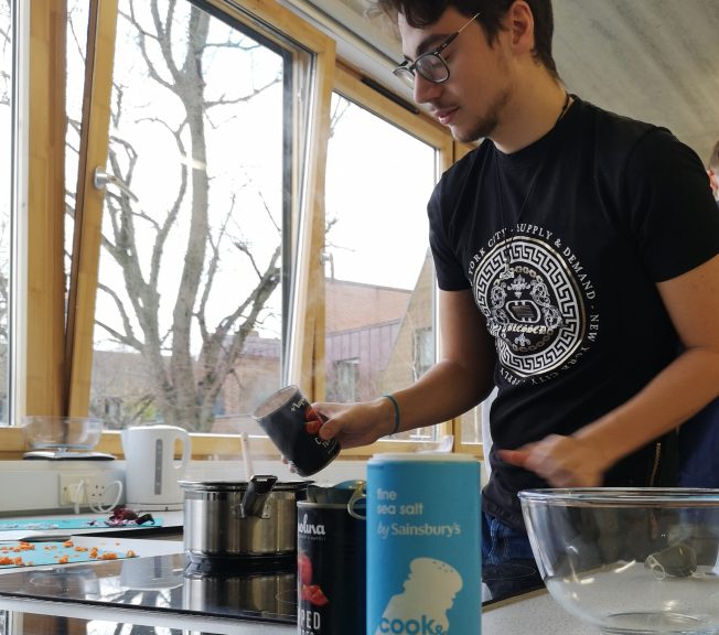 Lower School student cooking