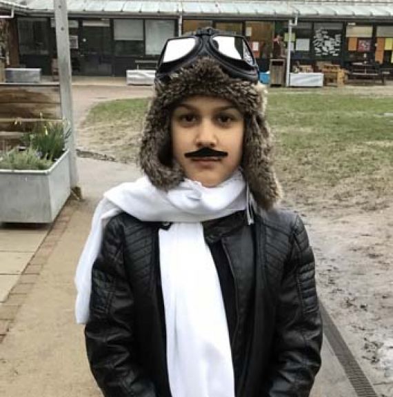 Lower school student wearing a costume