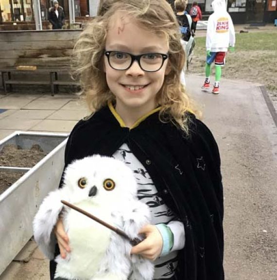 Lower school student wearing a costume