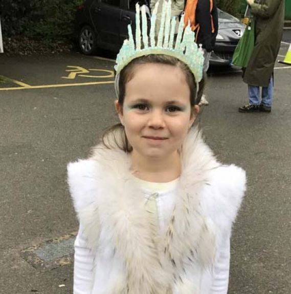 Lower school student wearing costume