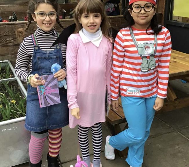 Lower school students wearing costumes