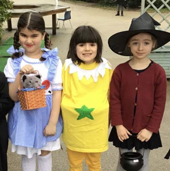 Lower school students wearing costumes