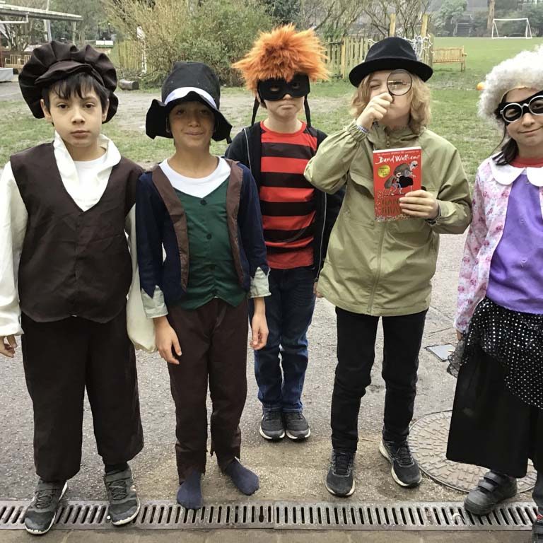 Lower school student wearing costumes