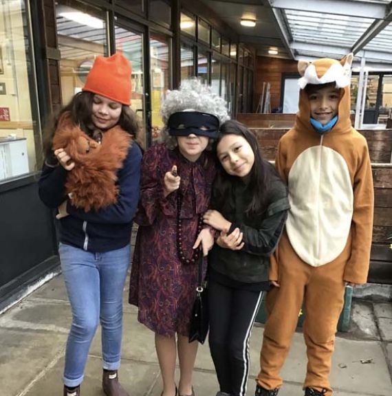 Lower school student wearing costumes