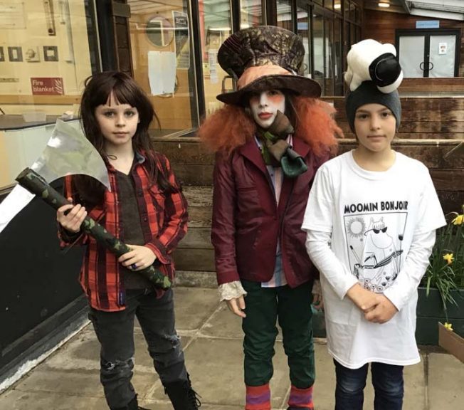 Lower school student wearing costumes