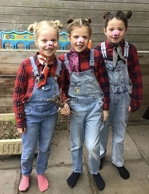 Lower school student wearing costumes