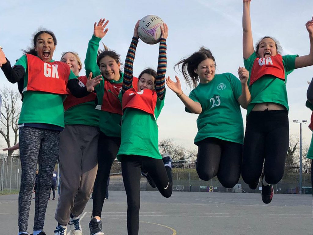 Netball team celebrate a win