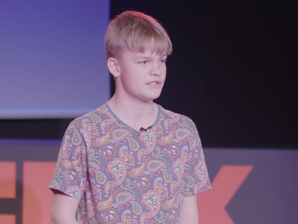Student giving a Tedx talk