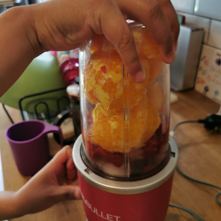 Student making a smoothie