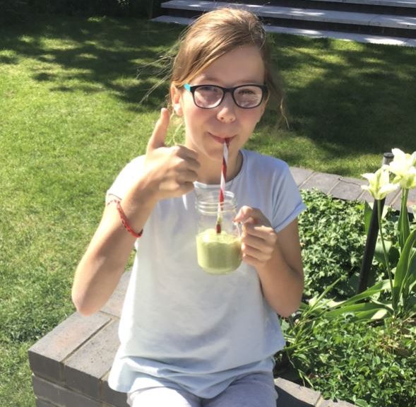 Student drinking a smoothie