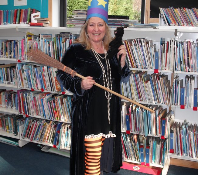 Woman wearing a wizard costume