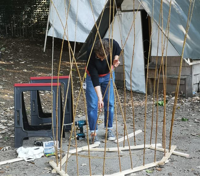 Teacher making a structure