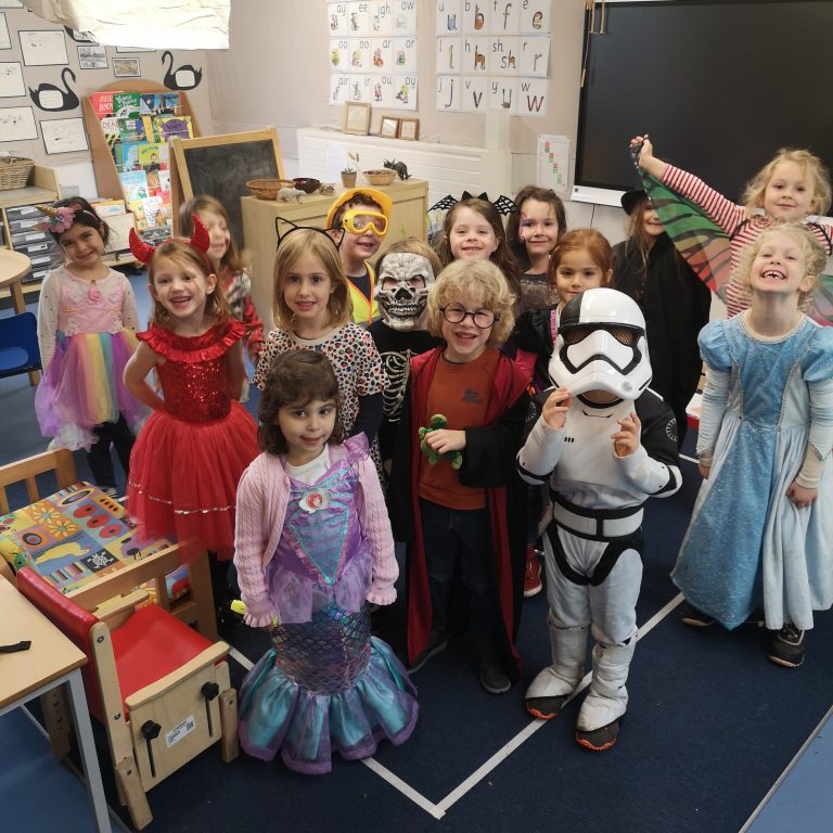 Students wearing Halloween costumes