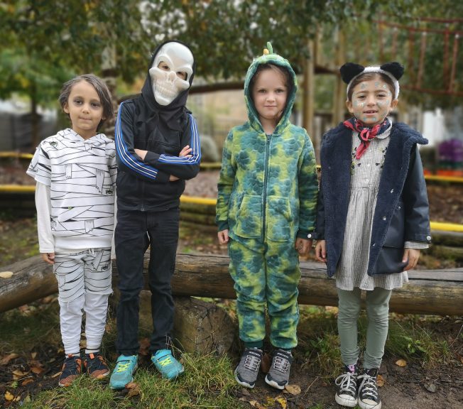 Students wearing Halloween costumes