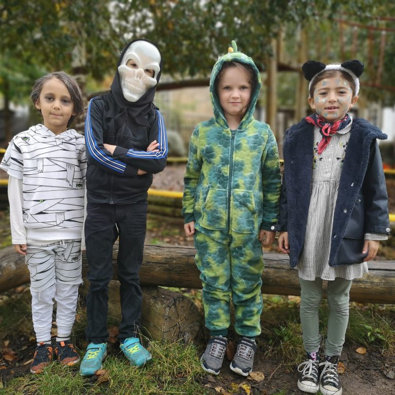 Students wearing Halloween costumes