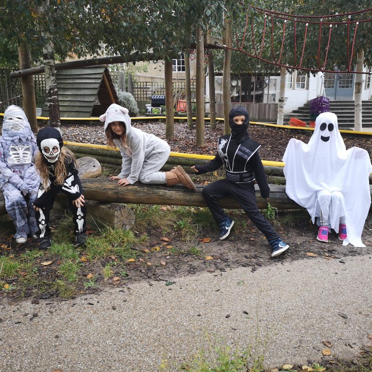 Students wearing Halloween costumes