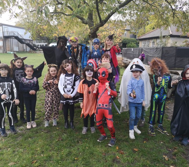 Students wearing Halloween costumes