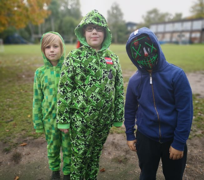 Students wearing Halloween costumes