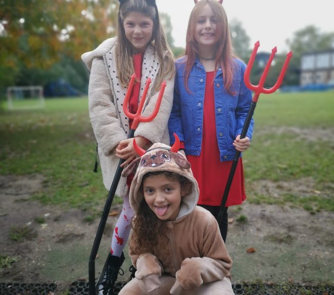 Students wearing Halloween costumes