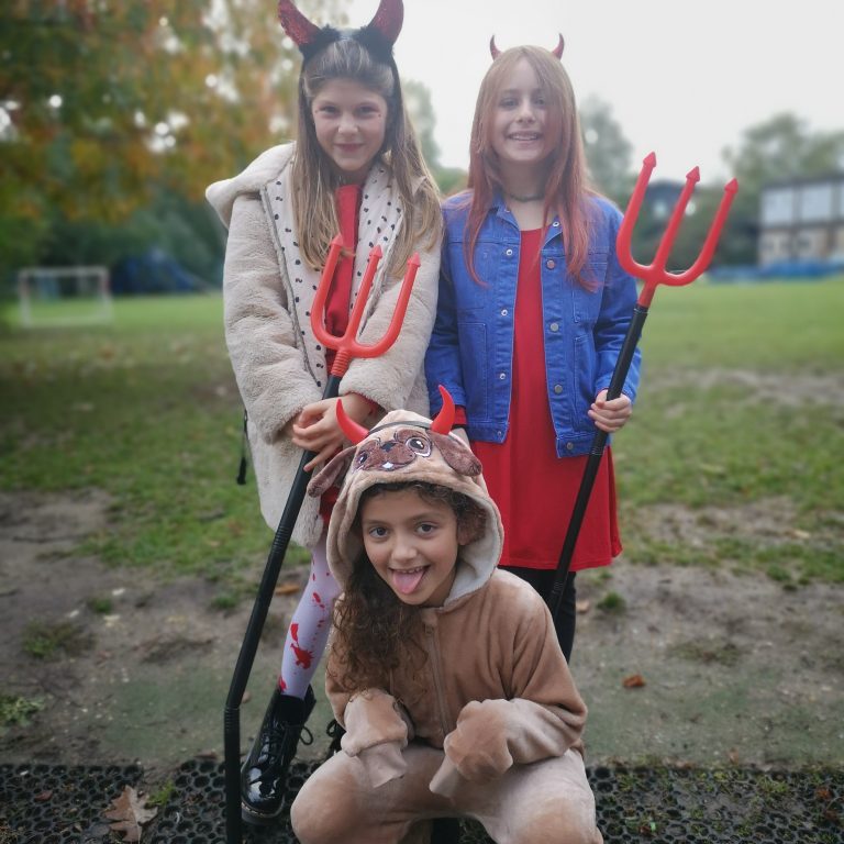 Students wearing Halloween costumes