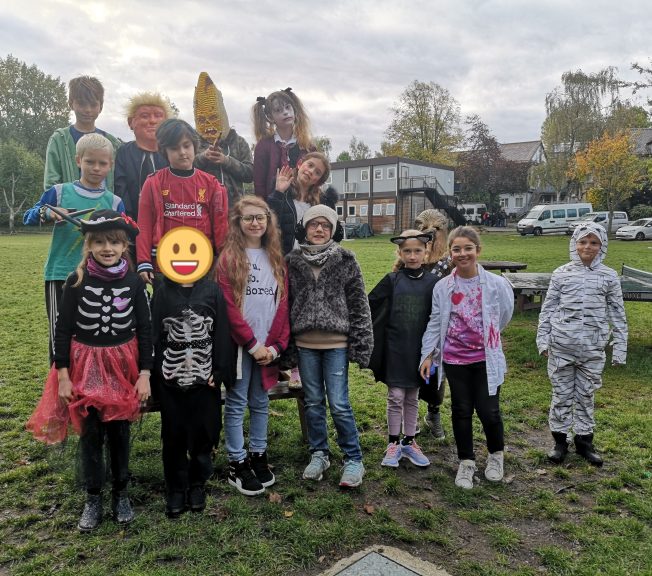 Students wearing Halloween costumes