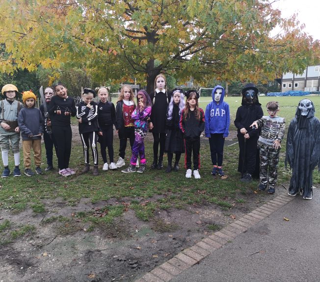 Students wearing Halloween costumes