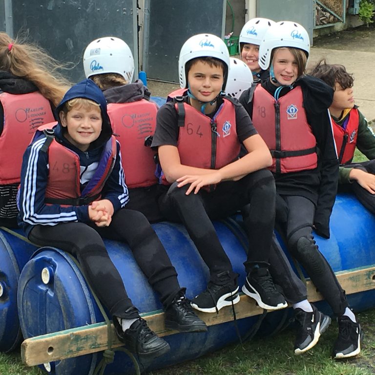 Students wearing life jackets