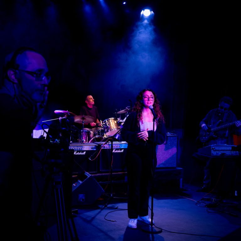 Student singing for school concert