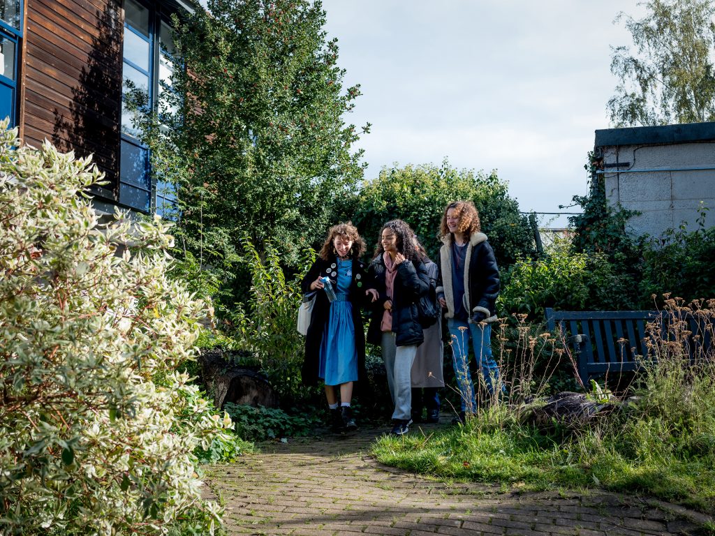 Upper School Students walking through the grounds of the school