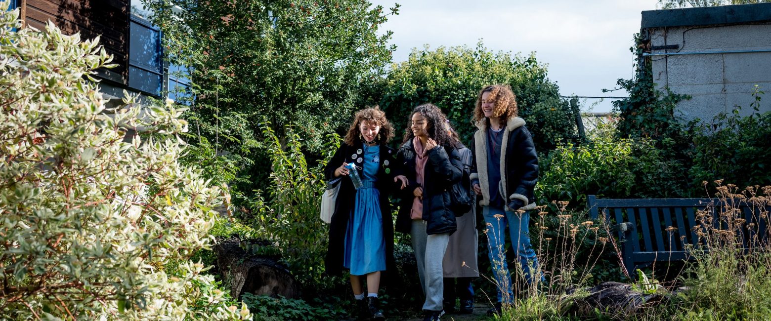 Upper School Students walking through the grounds of the school