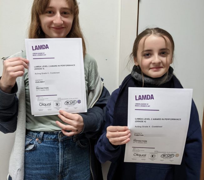 Students holding LAMDA results