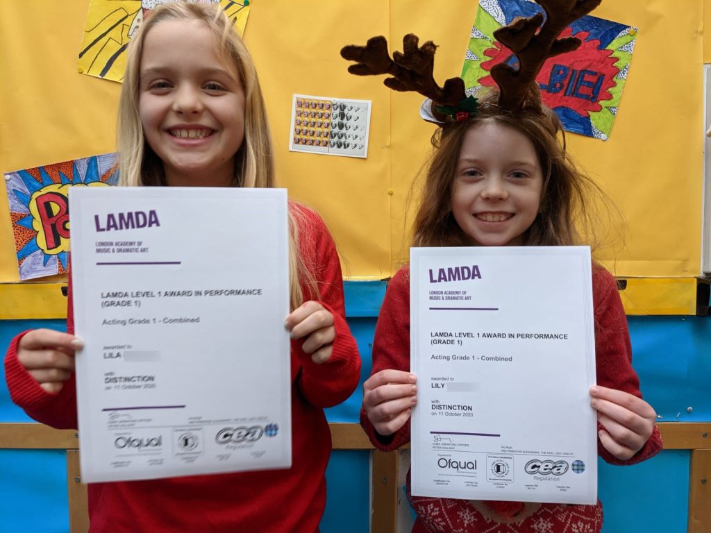 Students holding LAMDA results