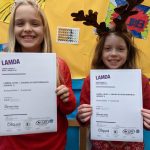 Students holding LAMDA results