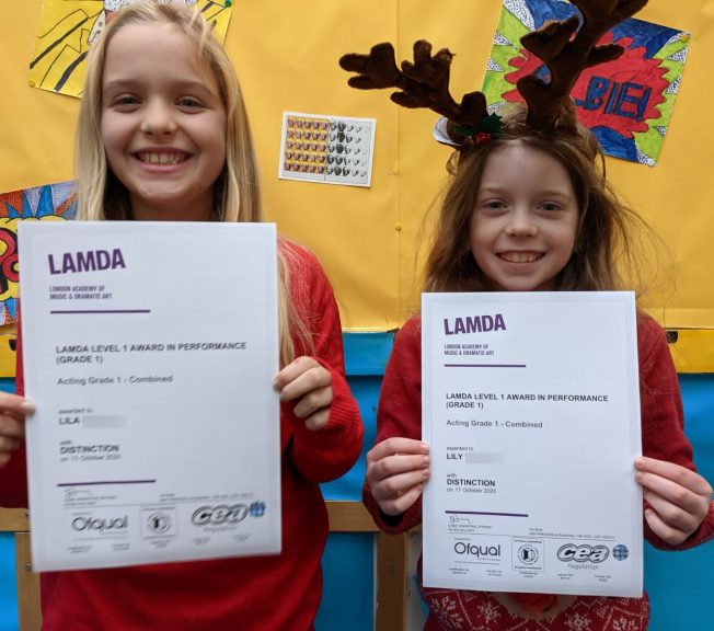 Students holding LAMDA results