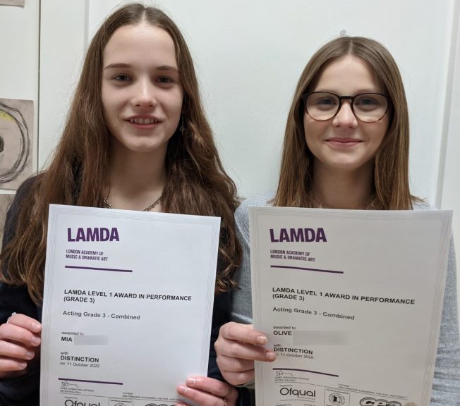 Students holding LAMDA results