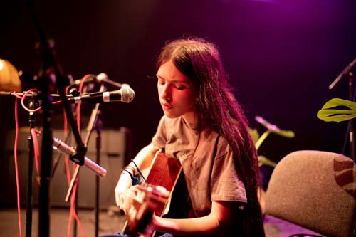 student playing guitar