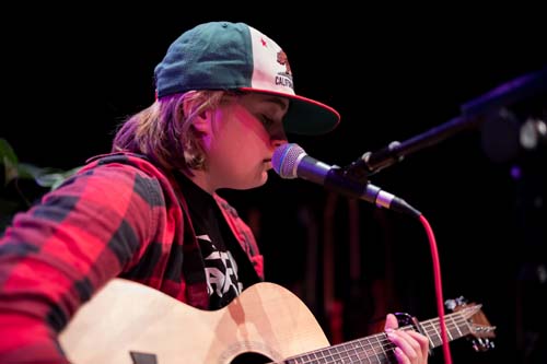 student playing guitar