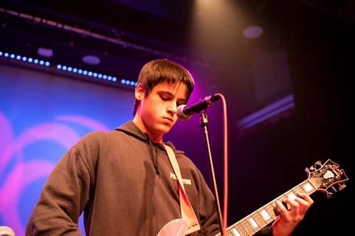 Student playing guitar