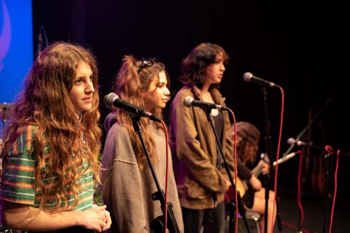 students performing in unplugged concert