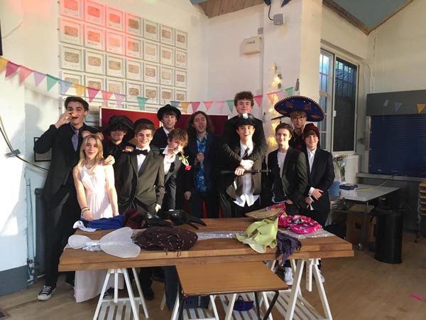 children stood in front of a table