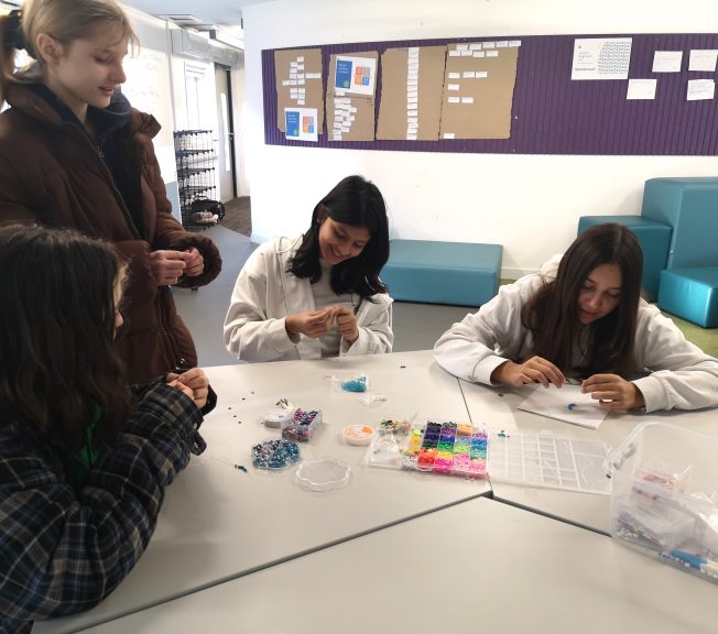 students making bracelets