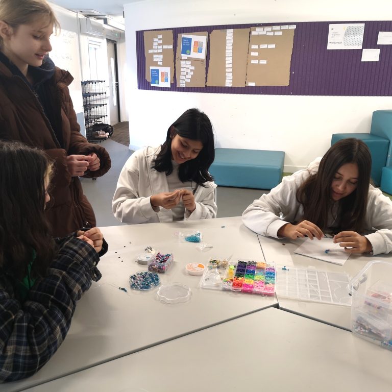 students making bracelets