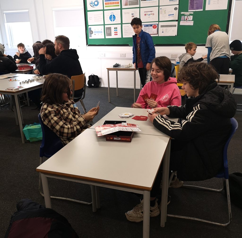 children playing card games