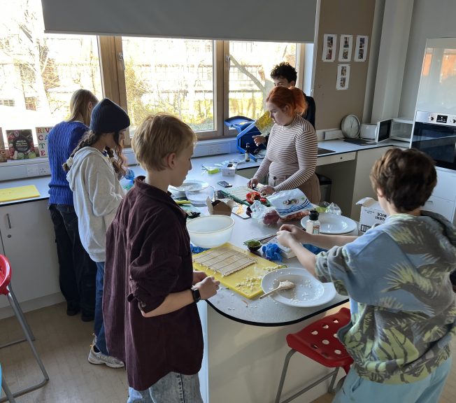 students making sushi