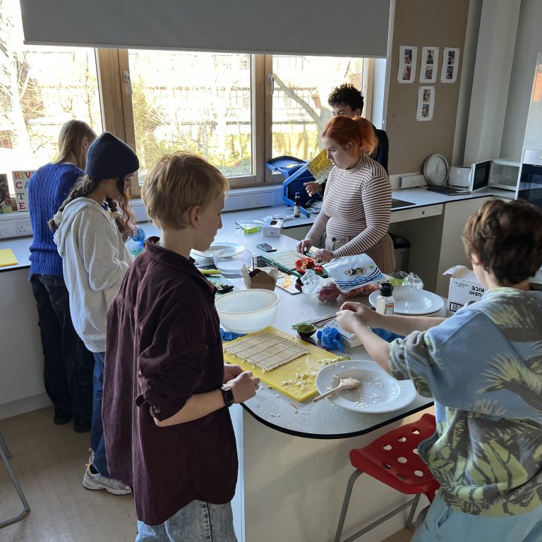 students making sushi