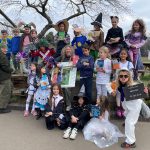 Students wearing world book day costumes