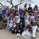 Students wearing world book day costumes